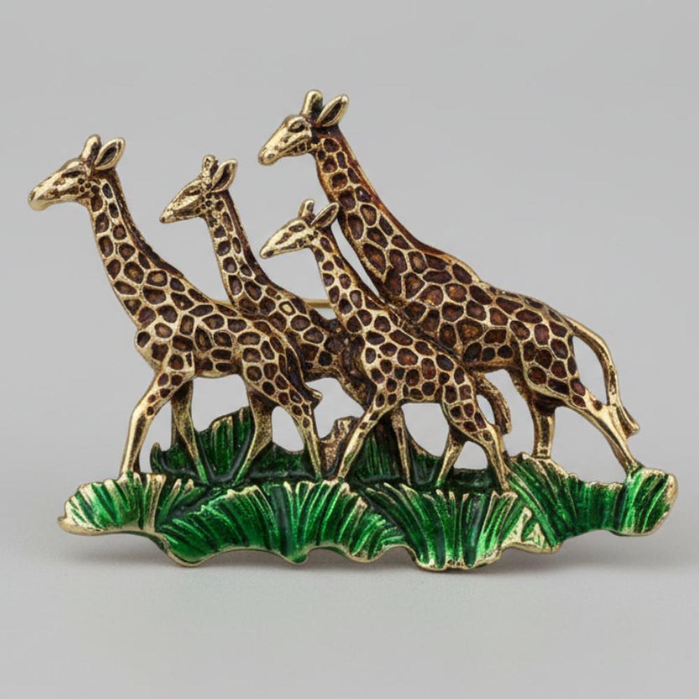 Large African giraffe herd brooch on a light gray background